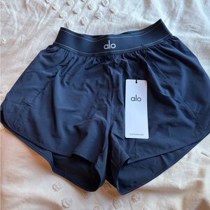 ALO Navy match point shorts